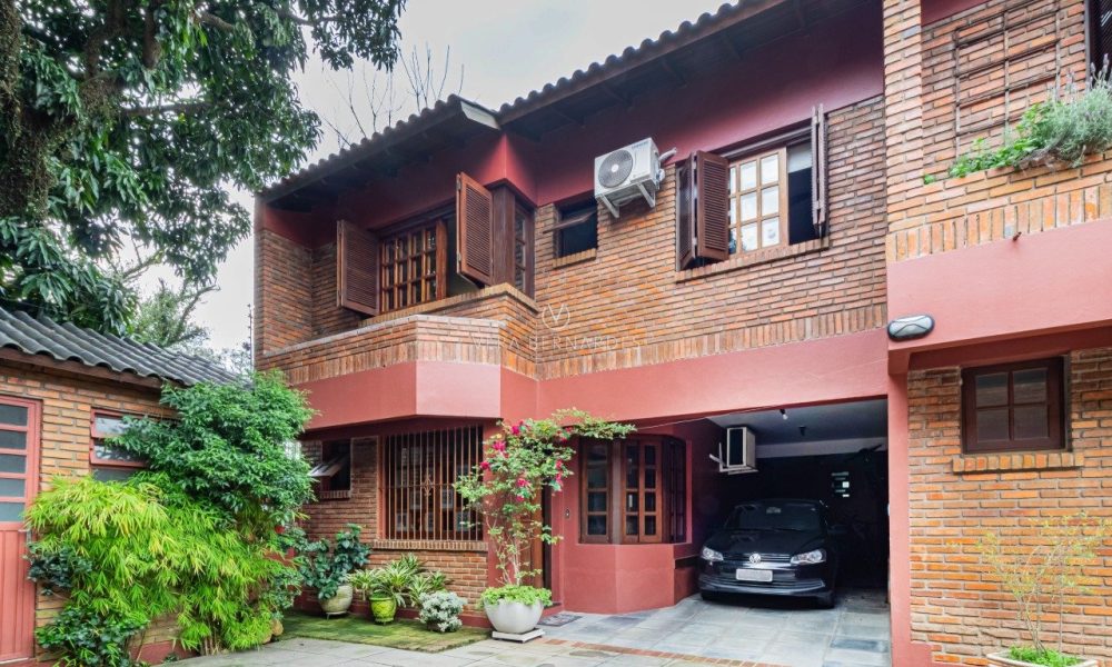 Casa em Condomínio à venda com 3 dormitórios, 177m² e 2 vagas no bairro Pedra Redonda, Zona Sul de Porto Alegre - 001