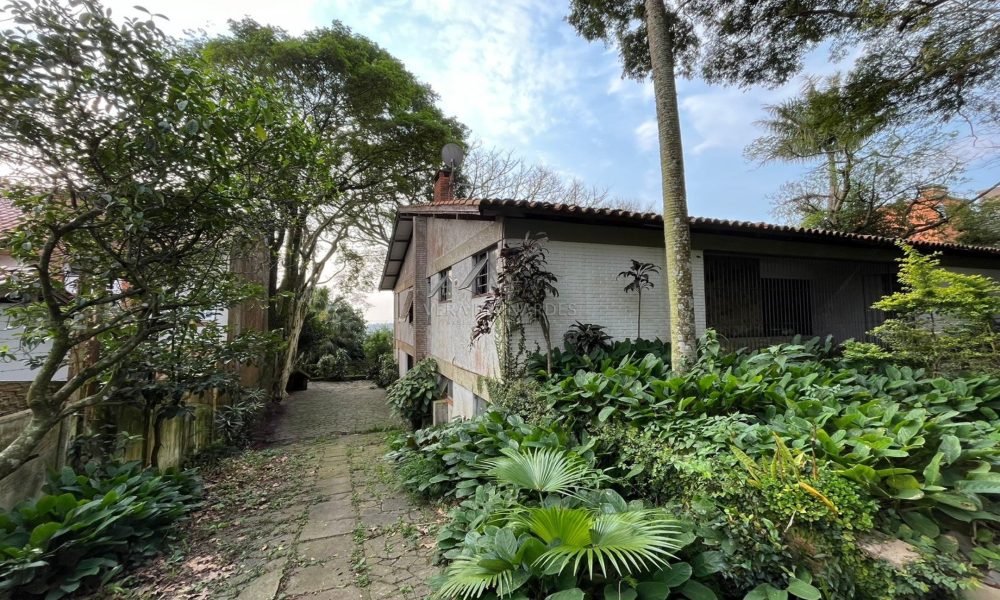 Casa à venda com 4 dormitórios, 360m² e 6 vagas no bairro Sétimo Céu, Zona Sul de Porto Alegre - 001