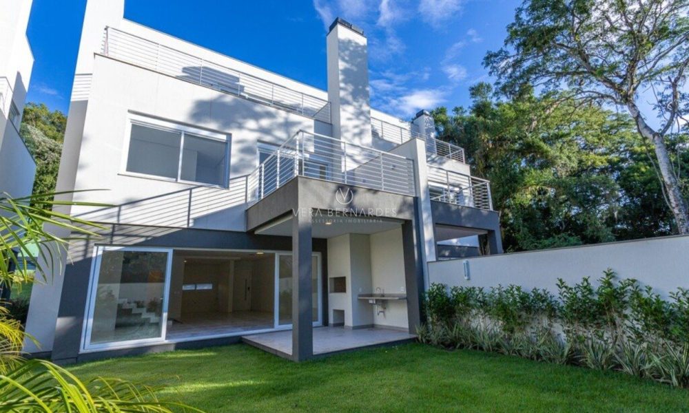 Casa em Condomínio à venda com 3 dormitórios, 276m² e 3 vagas no bairro Pedra Redonda, Zona Sul de Porto Alegre - 001