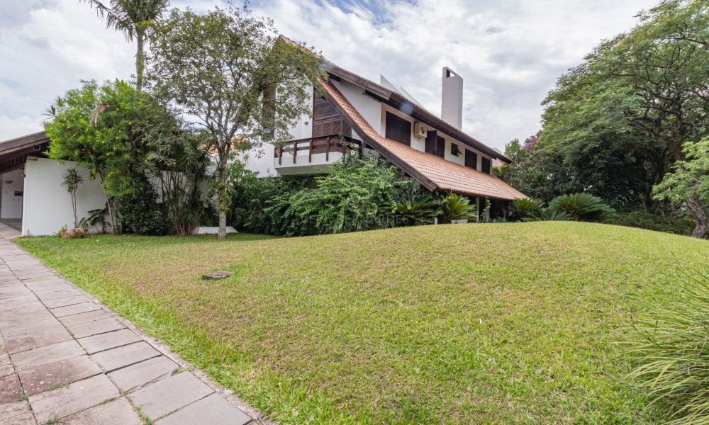 Casa em Condomínio à venda com 6 dormitórios, 702m² e 4 vagas no bairro Jardim do Sol, Zona Sul de Porto Alegre - 001