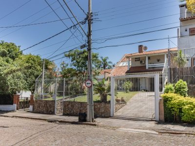 Casa à venda com 4 dormitórios, 312m² e 2 vagas no bairro Jardim Isabel, Zona Sul de Porto Alegre