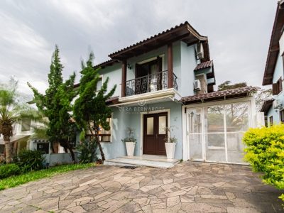 Casa em Condomínio à venda com 3 dormitórios, 169m² e 3 vagas no bairro Hípica, Zona Sul de Porto Alegre