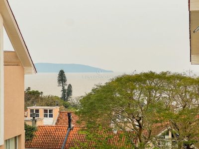 Casa em Condomínio à venda com 3 dormitórios, 230m² e 2 vagas no bairro Pedra Redonda, Zona Sul de Porto Alegre