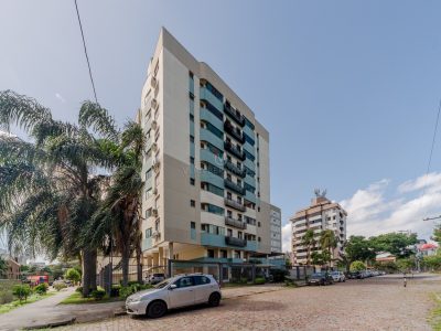 Apartamento à venda com 2 dormitórios, 77m² e 1 vaga no bairro Menino Deus, Zona Sul de Porto Alegre