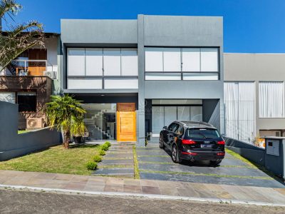 Casa em Condomínio à venda com 3 dormitórios, 200m² e 2 vagas no bairro Lagos de Nova Ipanema, Zona Sul de Porto Alegre