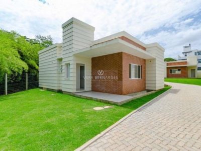 Casa em Condomínio à venda com 3 dormitórios, 123m² e 2 vagas no bairro Lagos de Nova Ipanema, Zona Sul de Porto Alegre