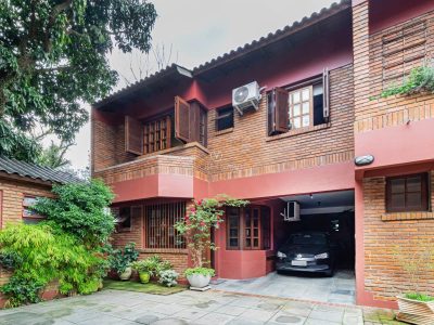 Casa em Condomínio à venda com 3 dormitórios, 177m² e 2 vagas no bairro Pedra Redonda, Zona Sul de Porto Alegre