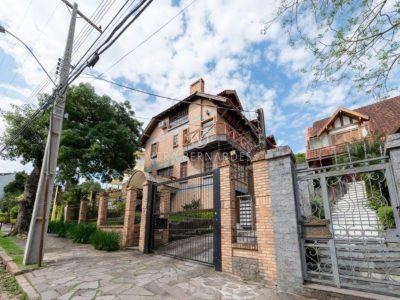 Casa em Condomínio à venda com 3 dormitórios, 278m² e 3 vagas no bairro Jardim Isabel, Zona Sul de Porto Alegre