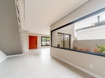 Casa em Condomínio à venda com 3 dormitórios, 157m² e 2 vagas no bairro Hípica, Zona Sul de Porto Alegre