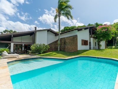 Casa em Condomínio à venda com 3 dormitórios, 388m² e 6 vagas no bairro Jardim do Sol, Zona Sul de Porto Alegre