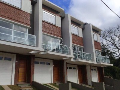 Casa à venda com 3 dormitórios, 160m² e 3 vagas no bairro Altos do Santa Rita, Zona Sul de Porto Alegre