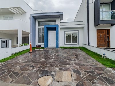 Casa em Condomínio à venda com 3 dormitórios, 107m² e 2 vagas no bairro Hípica, Zona Sul de Porto Alegre