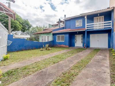 Casa à venda com 3 dormitórios, 142m² e 2 vagas no bairro Imperial Park, Zona Sul de Porto Alegre