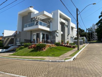 Casa em Condomínio à venda com 3 dormitórios, 203m² e 4 vagas no bairro Lagos de Nova Ipanema, Zona Sul de Porto Alegre