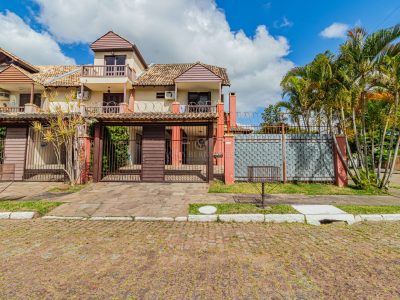 Casa à venda com 3 dormitórios, 266m² e 2 vagas no bairro Ipanema, Zona Sul de Porto Alegre