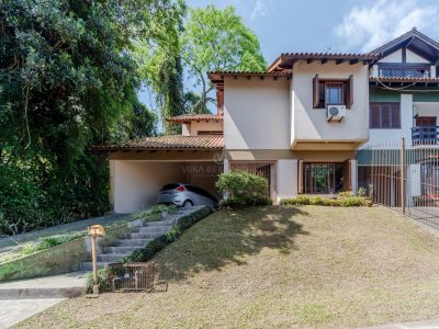 Casa à venda com 3 dormitórios, 180m² e 2 vagas no bairro Jardim Isabel, Zona Sul de Porto Alegre