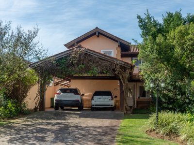 Casa em Condomínio à venda com 4 dormitórios, 229m² e 2 vagas no bairro Terra Ville, Zona Sul de Porto Alegre