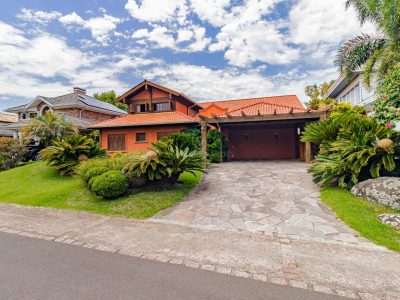 Casa em Condomínio à venda com 4 dormitórios, 596m² e 4 vagas no bairro Terra Ville, Zona Sul de Porto Alegre