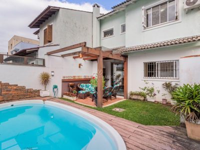 Casa à venda com 3 dormitórios, 113m² e 2 vagas no bairro Hípica, Zona Sul de Porto Alegre