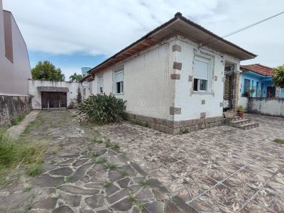 Casa Térrea à venda com 3 dormitórios, 135m² e 4 vagas no bairro Ipanema, Zona Sul de Porto Alegre