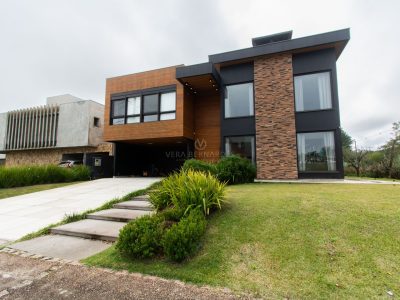 Casa em Condomínio à venda com 5 dormitórios, 560m² e 4 vagas no bairro Terra Ville, Zona Sul de Porto Alegre