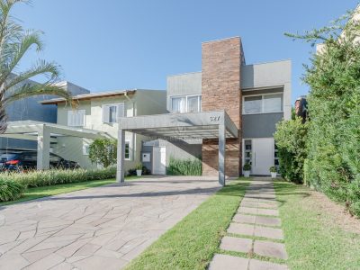 Casa em Condomínio à venda com 4 dormitórios, 297m² e 4 vagas no bairro Terra Ville, Zona Sul de Porto Alegre