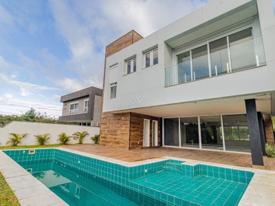 Casa em Condomínio à venda com 4 dormitórios, 440m² e 4 vagas no bairro Alphaville, Zona Sul de Porto Alegre