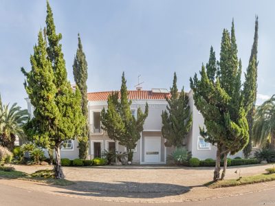 Casa em Condomínio à venda com 4 dormitórios, 750m² e 4 vagas no bairro Terra Ville, Zona Sul de Porto Alegre