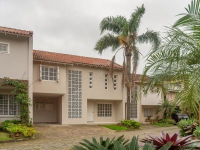 Casa em Condomínio à venda com 4 dormitórios, 221m² e 2 vagas no bairro Jardim Isabel, Zona Sul de Porto Alegre