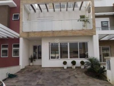 Casa em Condomínio à venda com 4 dormitórios, 252m² e 2 vagas no bairro Lagos de Nova Ipanema, Zona Sul de Porto Alegre