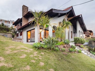 Casa em Condomínio à venda com 4 dormitórios, 522m² e 4 vagas no bairro Nonoai, Zona Sul de Porto Alegre