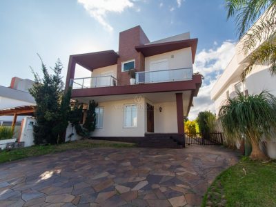 Casa em Condomínio à venda com 3 dormitórios, 186m² e 4 vagas no bairro Hípica, Zona Sul de Porto Alegre