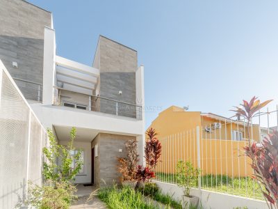 Casa à venda com 2 dormitórios, 94m² e 1 vaga no bairro Hípica, Zona Sul de Porto Alegre