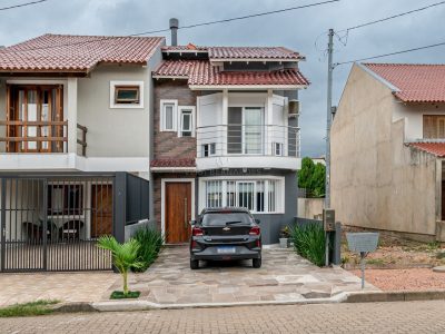 Casa à venda com 2 dormitórios, 75m² e 2 vagas no bairro Aberta dos Morros, Zona Sul de Porto Alegre