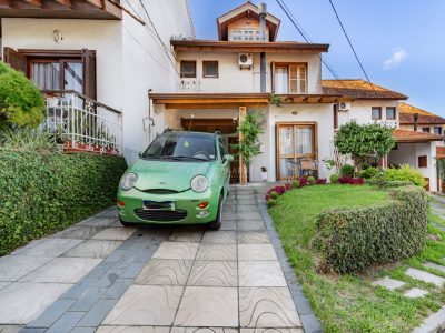 Casa em Condomínio à venda com 3 dormitórios, 105m² e 2 vagas no bairro Cavalhada, Zona Sul de Porto Alegre