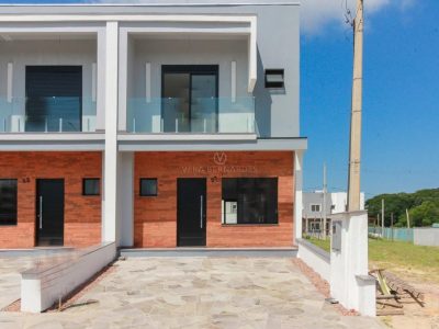 Casa em Condomínio à venda com 3 dormitórios, 120m² e 2 vagas no bairro Campo Novo, Zona Sul de Porto Alegre