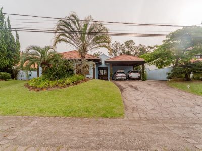 Casa em Condomínio à venda com 3 dormitórios, 290m² e 2 vagas no bairro Terra Ville, Zona Sul de Porto Alegre