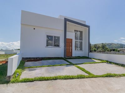 Casa à venda com 3 dormitórios, 110m² e 2 vagas no bairro Lagos de Nova Ipanema, Zona Sul de Porto Alegre