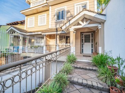 Casa à venda com 4 dormitórios, 315m² e 3 vagas no bairro Jardim Isabel, Zona Sul de Porto Alegre