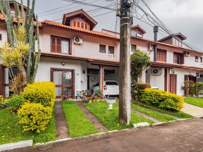 Casa em Condomínio à venda com 3 dormitórios, 160m² e 2 vagas no bairro Cavalhada, Zona Sul de Porto Alegre