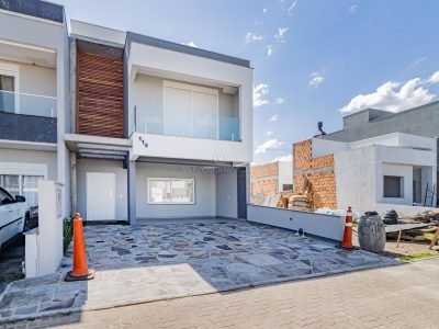 Casa em Condomínio à venda com 3 dormitórios, 162m² e 2 vagas no bairro Hípica, Zona Sul de Porto Alegre