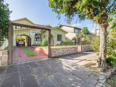 Casa à venda com 4 dormitórios, 316m² e 3 vagas no bairro Vila Assunção, Zona Sul de Porto Alegre