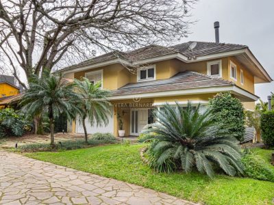 Casa em Condomínio à venda com 4 dormitórios, 550m² e 2 vagas no bairro Jardim do Sol, Zona Sul de Porto Alegre