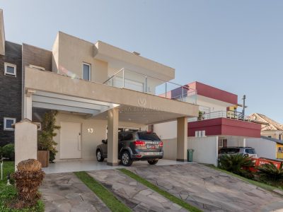 Casa em Condomínio à venda com 3 dormitórios, 245m² e 4 vagas no bairro Hípica, Zona Sul de Porto Alegre