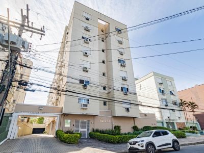 Apartamento à venda com 2 dormitórios, 51m² e 1 vaga no bairro Menino Deus, Zona Leste de Porto Alegre