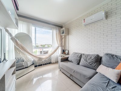 Apartamento à venda com 2 dormitórios, 56m² e 1 vaga no bairro Cavalhada, Zona Sul de Porto Alegre