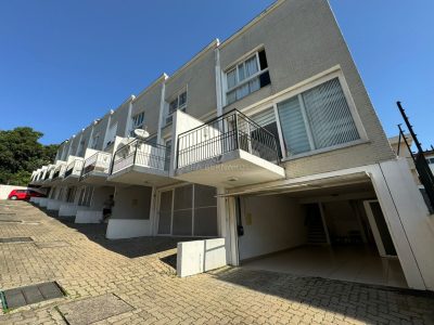 Casa em Condomínio à venda com 3 dormitórios, 154m² e 2 vagas no bairro Camaquã, Zona Sul de Porto Alegre