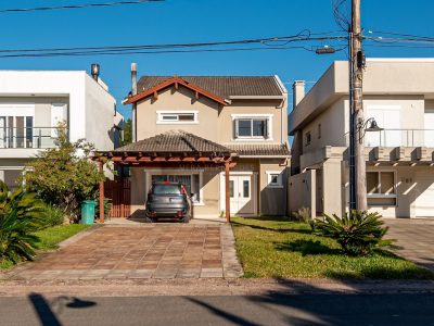 Casa em Condomínio à venda com 3 dormitórios, 217m² e 4 vagas no bairro Terra Ville, Zona Sul de Porto Alegre