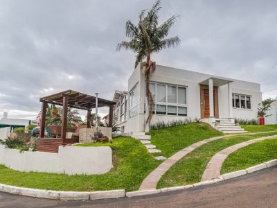 Casa em Condomínio à venda com 5 dormitórios, 433m² e 4 vagas no bairro Nonoai, Zona Sul de Porto Alegre