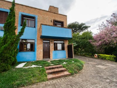 Casa em Condomínio à venda com 2 dormitórios, 142m² e 2 vagas no bairro Cavalhada, Zona Sul de Porto Alegre